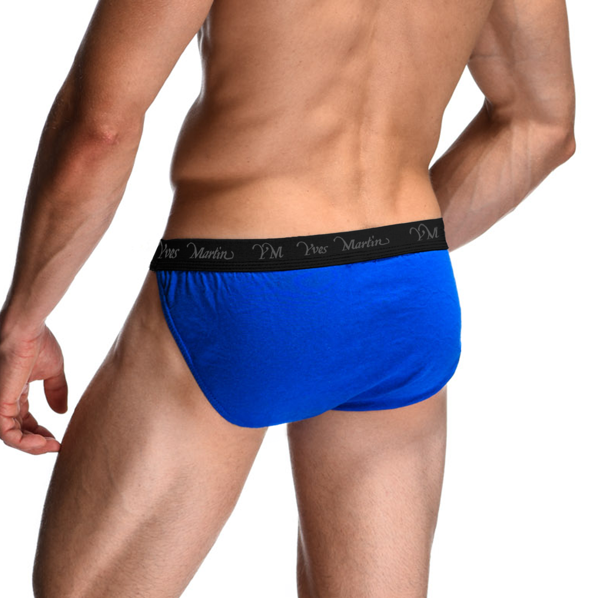 Male model wearing blue Yves Martin tanga briefs, rear three-quarter view